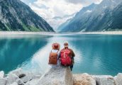 Travelers,Couple,Look,At,The,Mountain,Lake.,Travel,And,Active